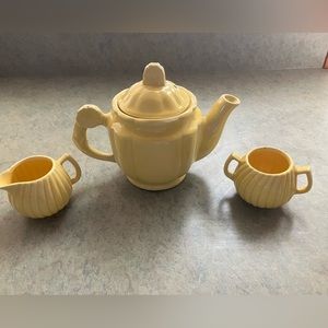 Vintage ceramic tea pot with creamer and sugar bowls